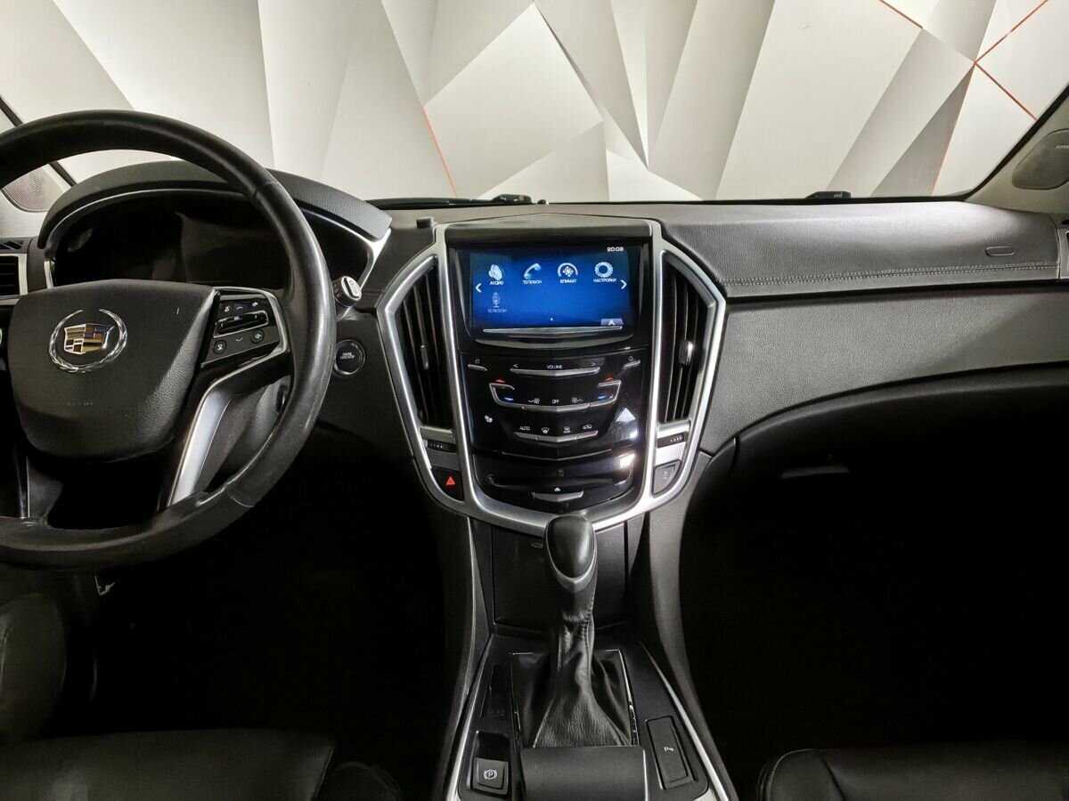 Cadillac SRX с пробегом — 2014 год. Фото: #10