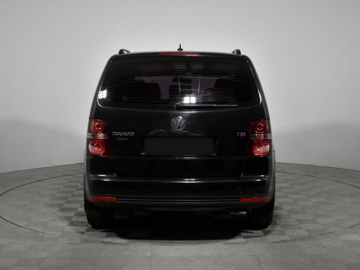Volkswagen Touran с пробегом — 2010 год. Фото: #5