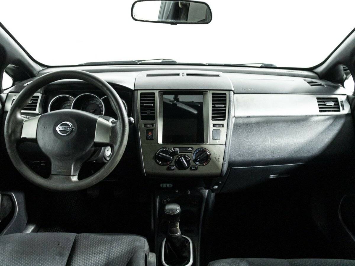 Nissan Tiida с пробегом — 2010 год. Фото: #12