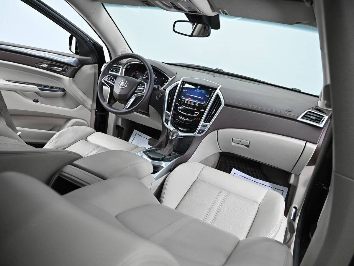Cadillac SRX с пробегом — 2013 год. Фото: #12