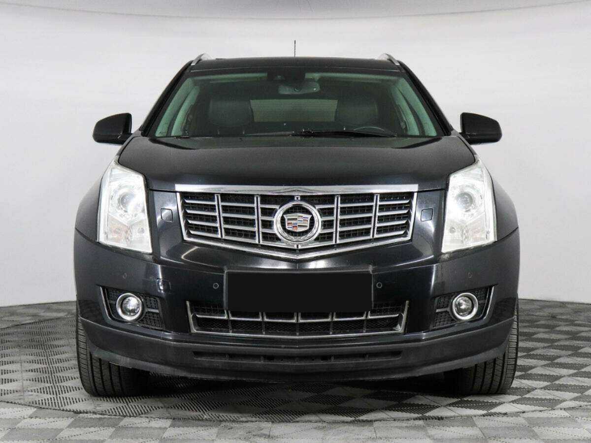 Cadillac SRX с пробегом — 2013 год. Фото: #1