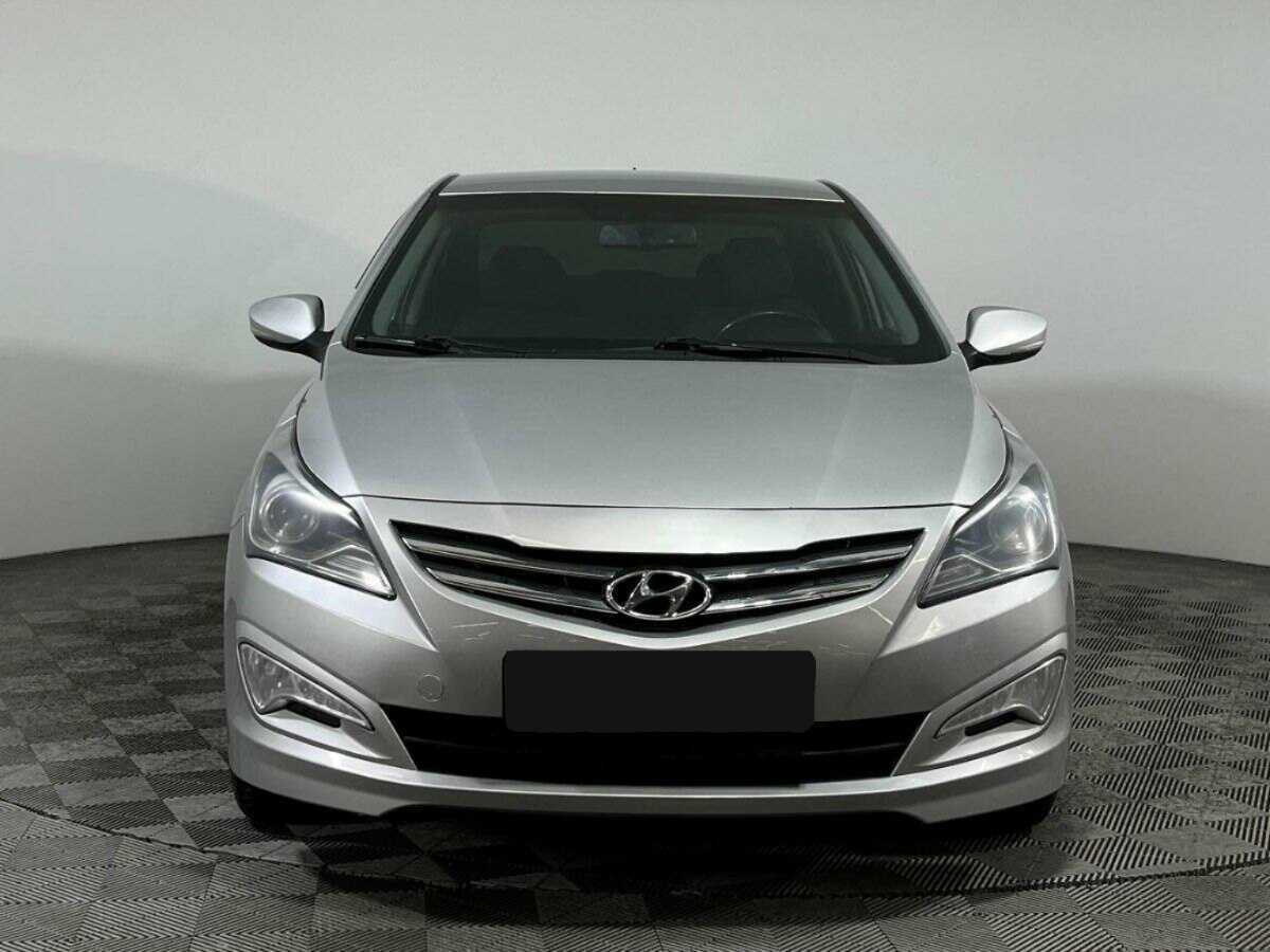 Hyundai Solaris с пробегом — 2014 год. Фото: #1