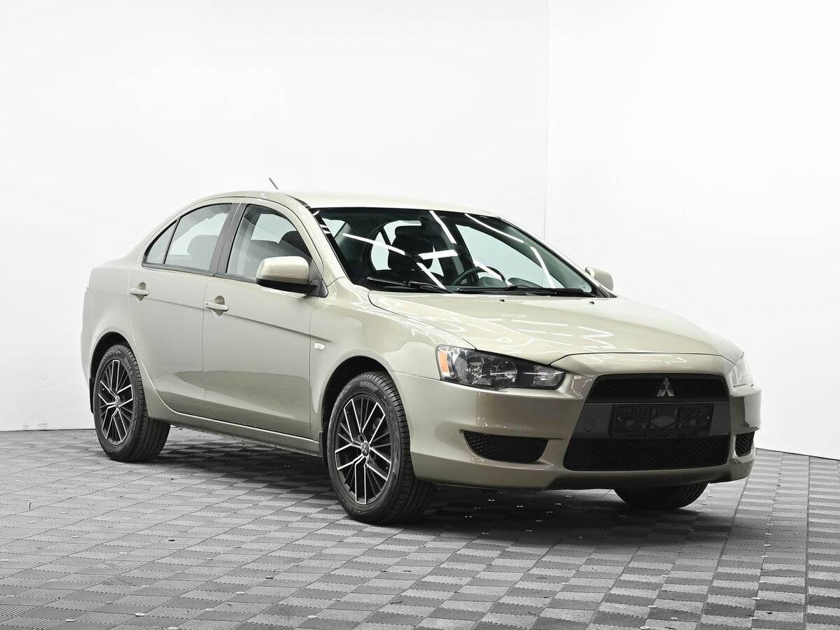 Mitsubishi Lancer с пробегом — 2010 год. Фото: #1