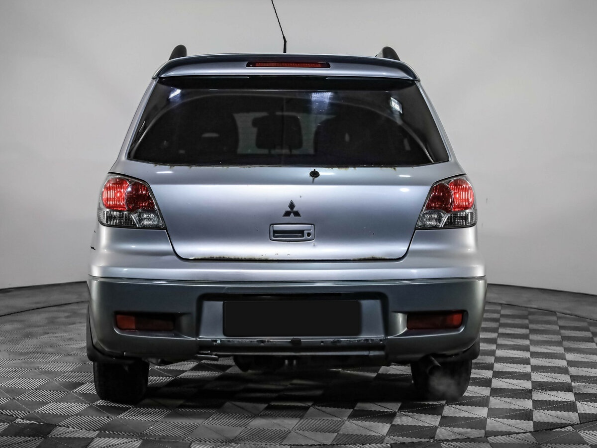 Mitsubishi Outlander с пробегом — 2004 год. Фото: #3