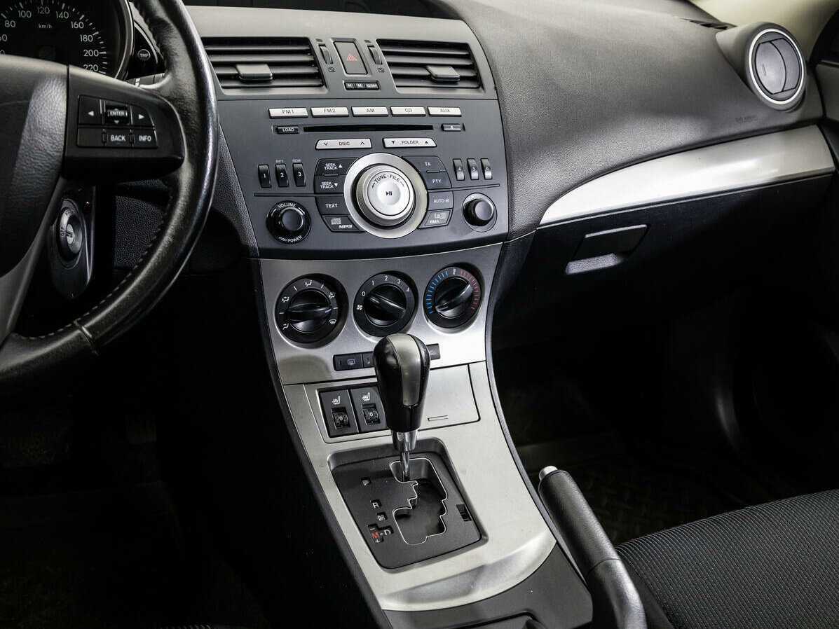 Mazda 3 с пробегом — 2010 год. Фото: #12
