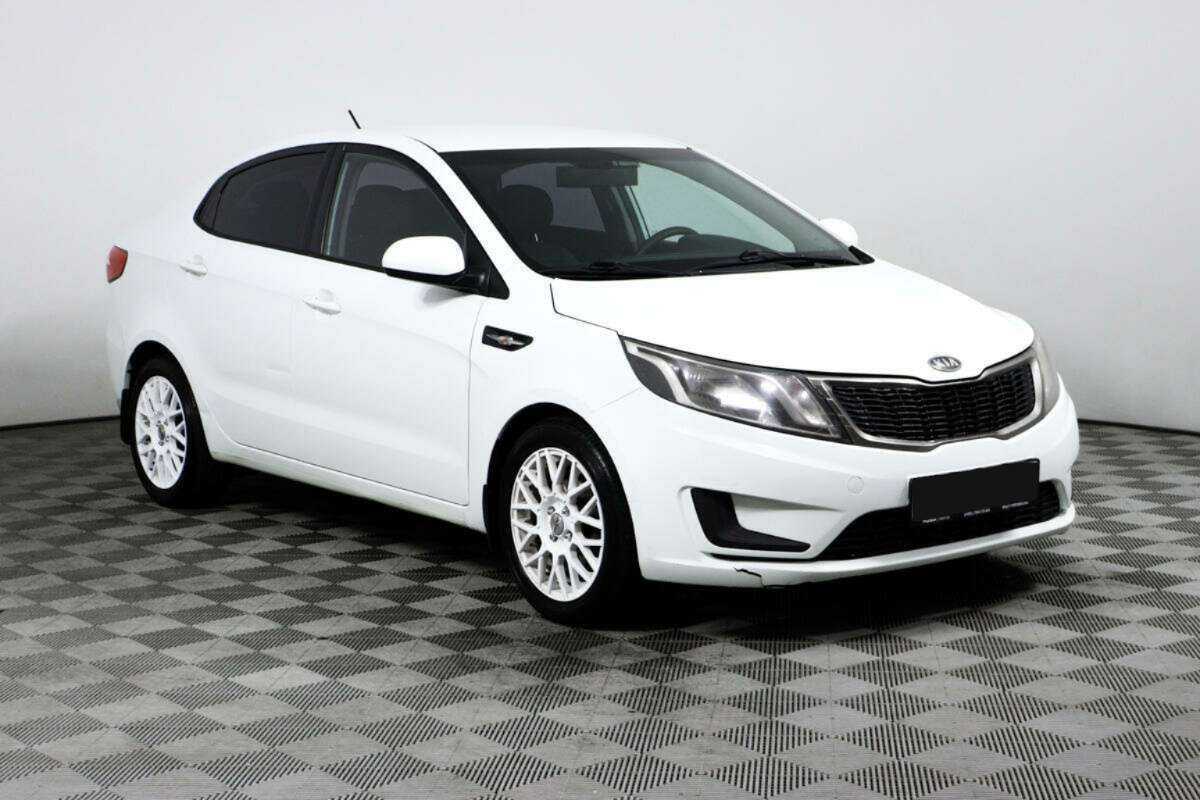 Kia Rio с пробегом — 2012 год. Фото: #2
