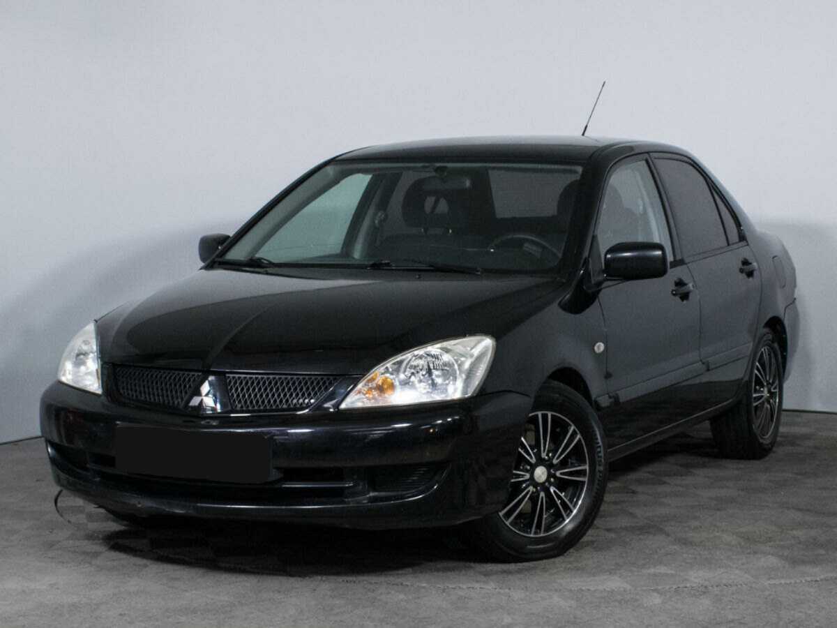 Mitsubishi Lancer с пробегом — 2009 год. Фото: #0