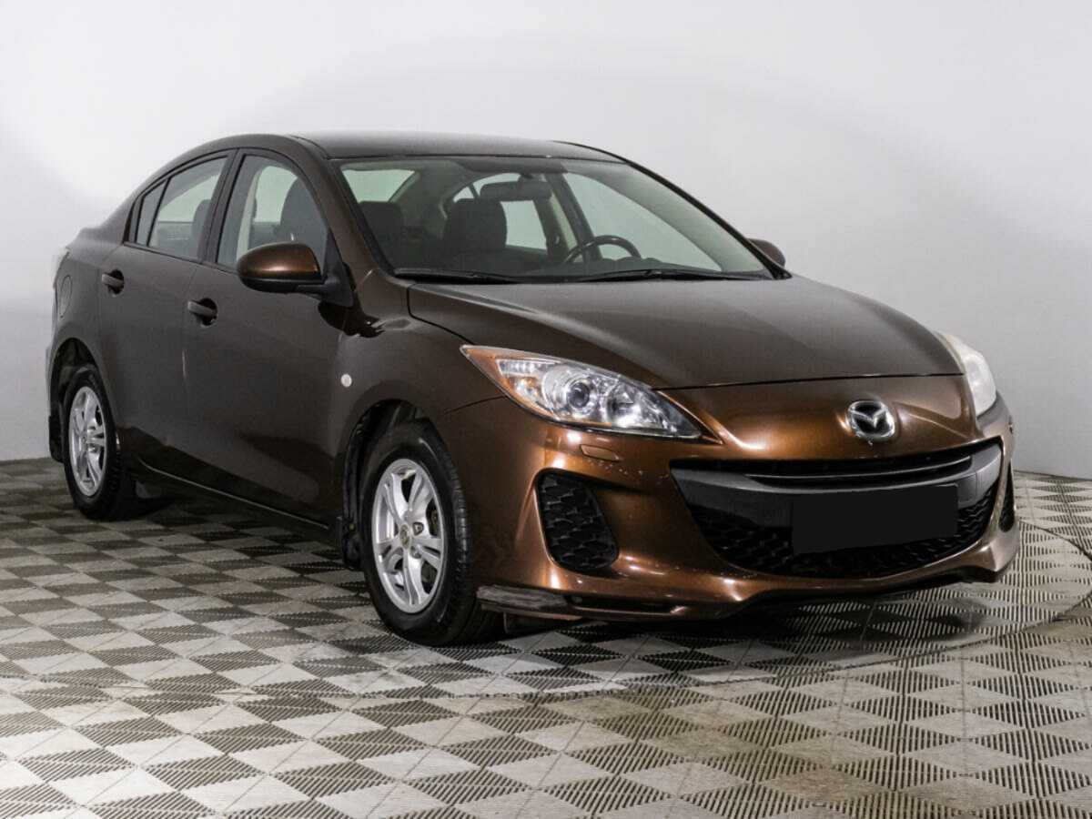 Mazda 3 с пробегом — 2011 год. Фото: #2