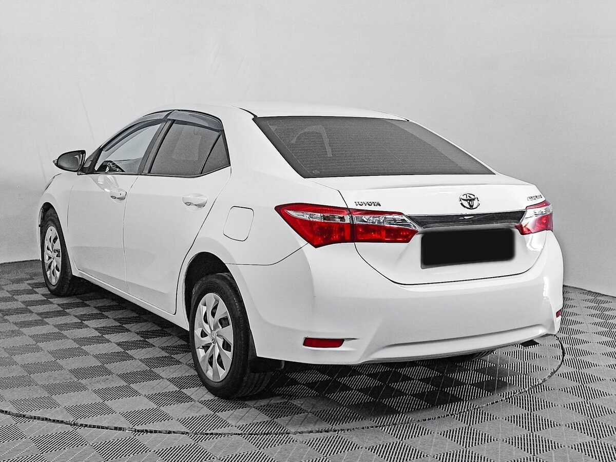 Toyota Corolla с пробегом — 2013 год. Фото: #6