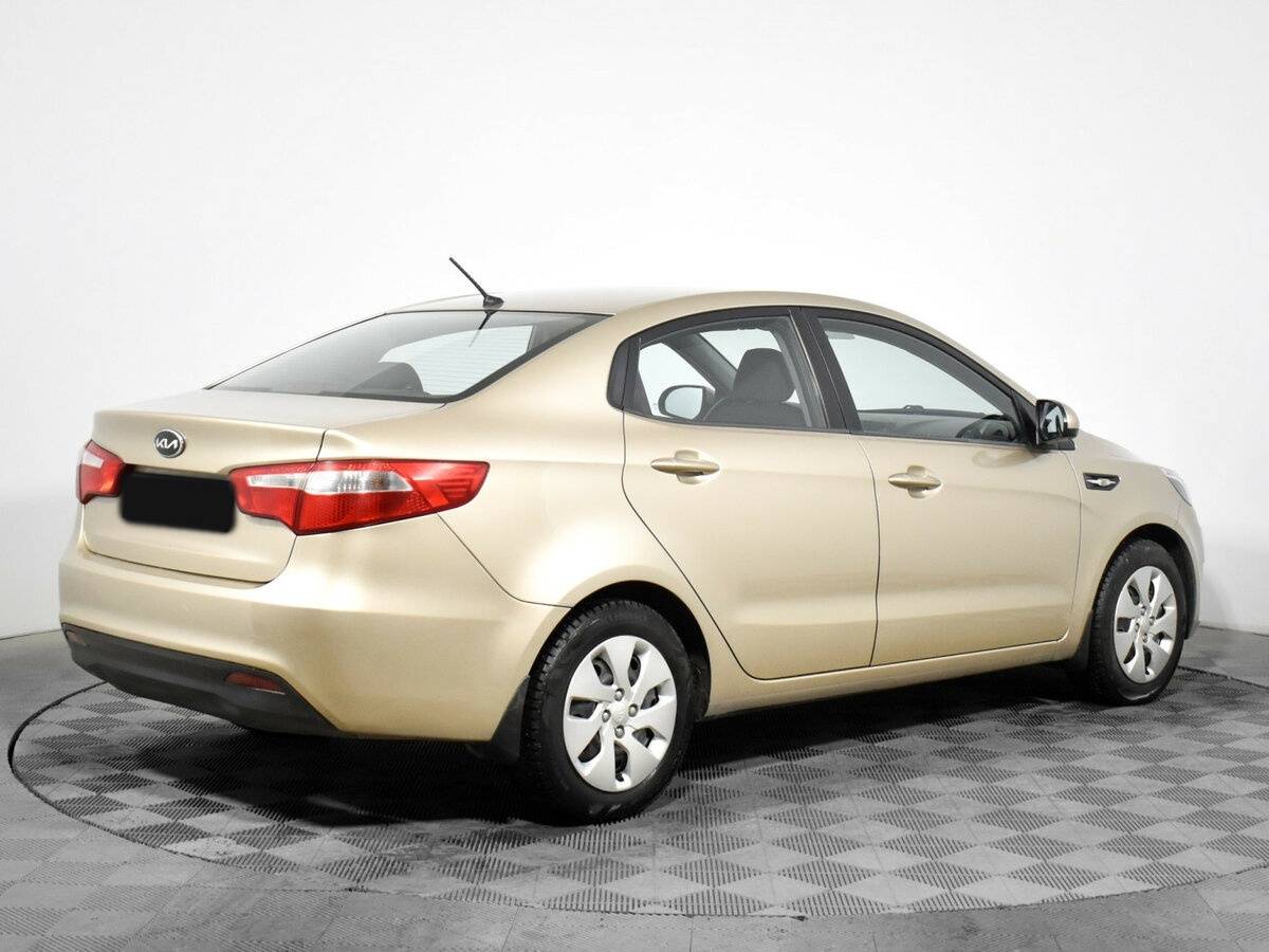 Kia Rio с пробегом — 2011 год. Фото: #4