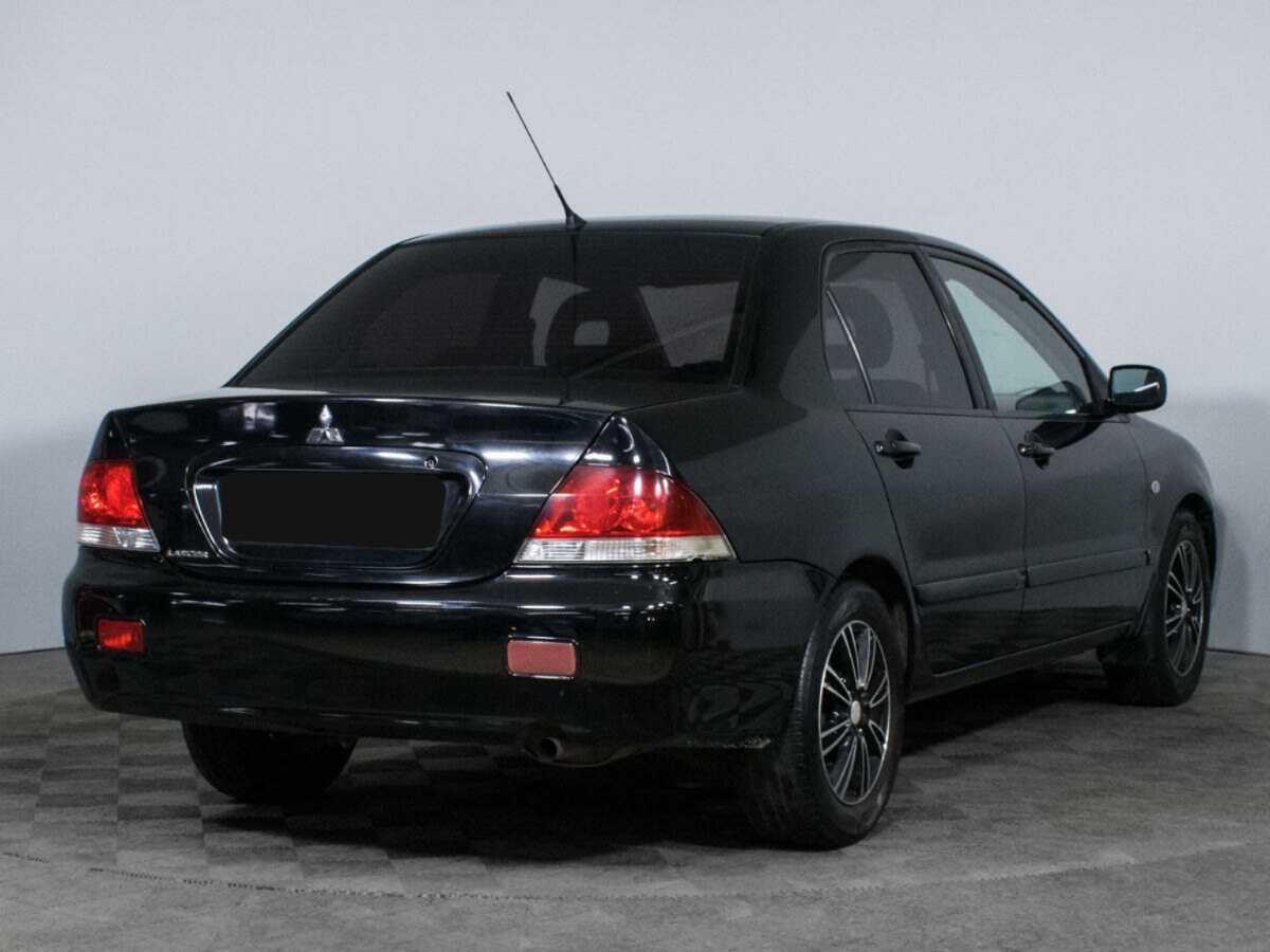 Mitsubishi Lancer с пробегом — 2009 год. Фото: #4