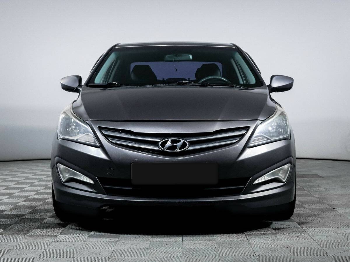 Hyundai Solaris с пробегом — 2014 год. Фото: #1