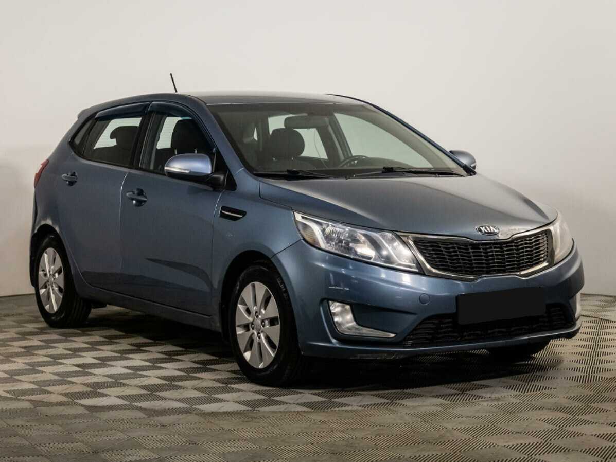 Kia Rio с пробегом — 2013 год. Фото: #1