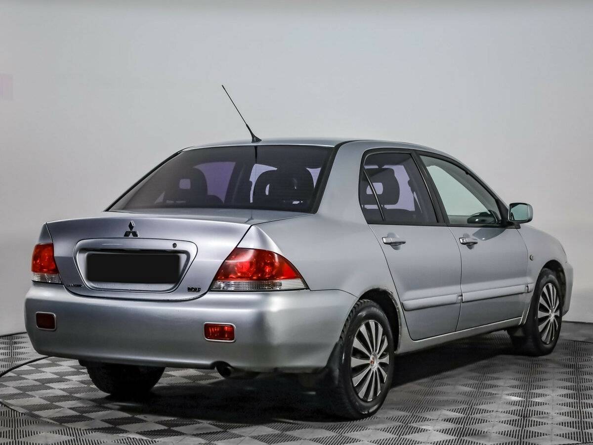 Mitsubishi Lancer с пробегом — 2006 год. Фото: #3
