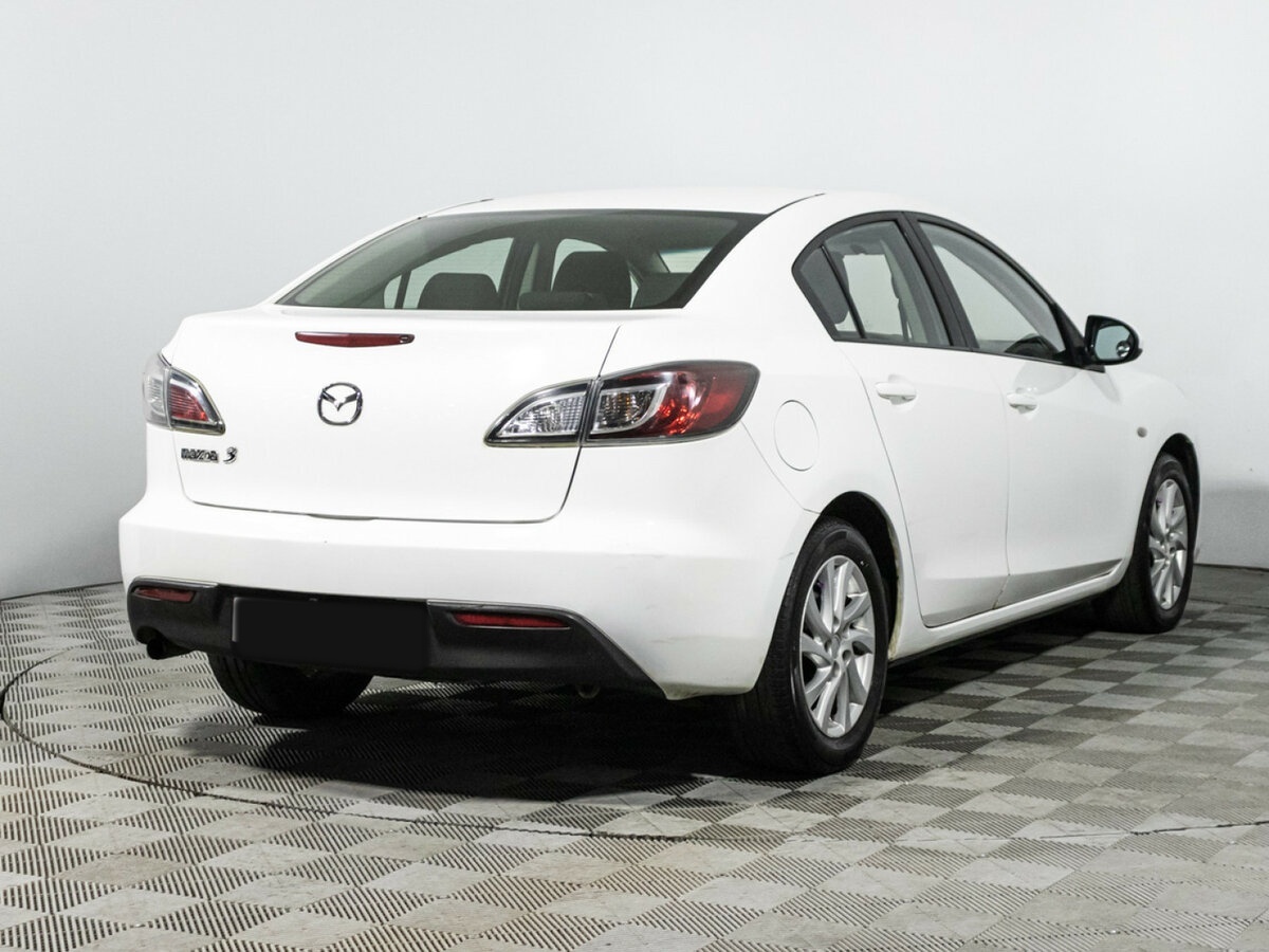 Mazda 3 с пробегом — 2010 год. Фото: #4
