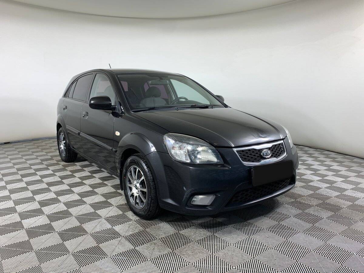 Kia Rio с пробегом — 2010 год. Фото: #2