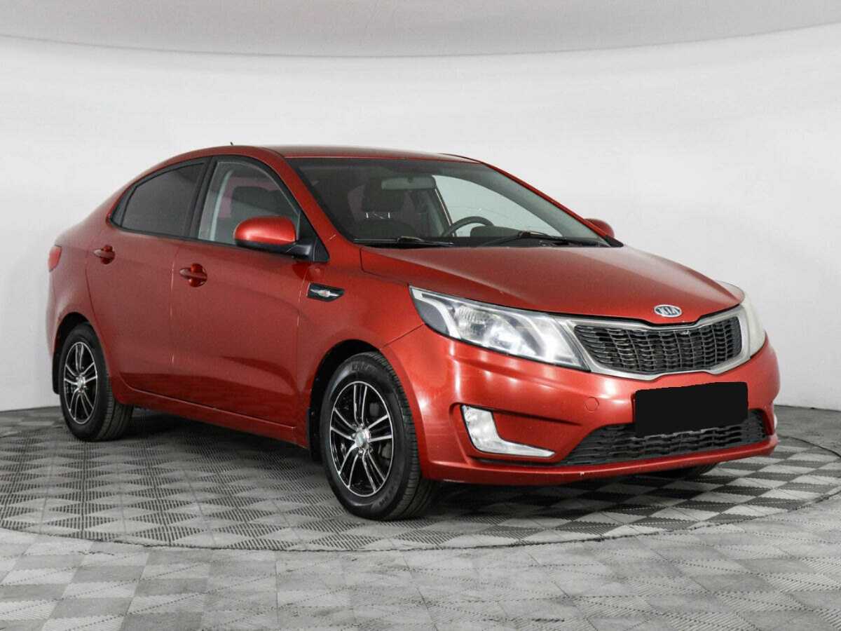 Kia Rio с пробегом — 2011 год. Фото: #2
