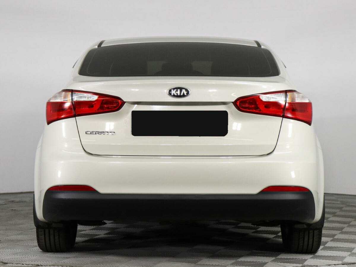 Kia Cerato с пробегом — 2013 год. Фото: #5