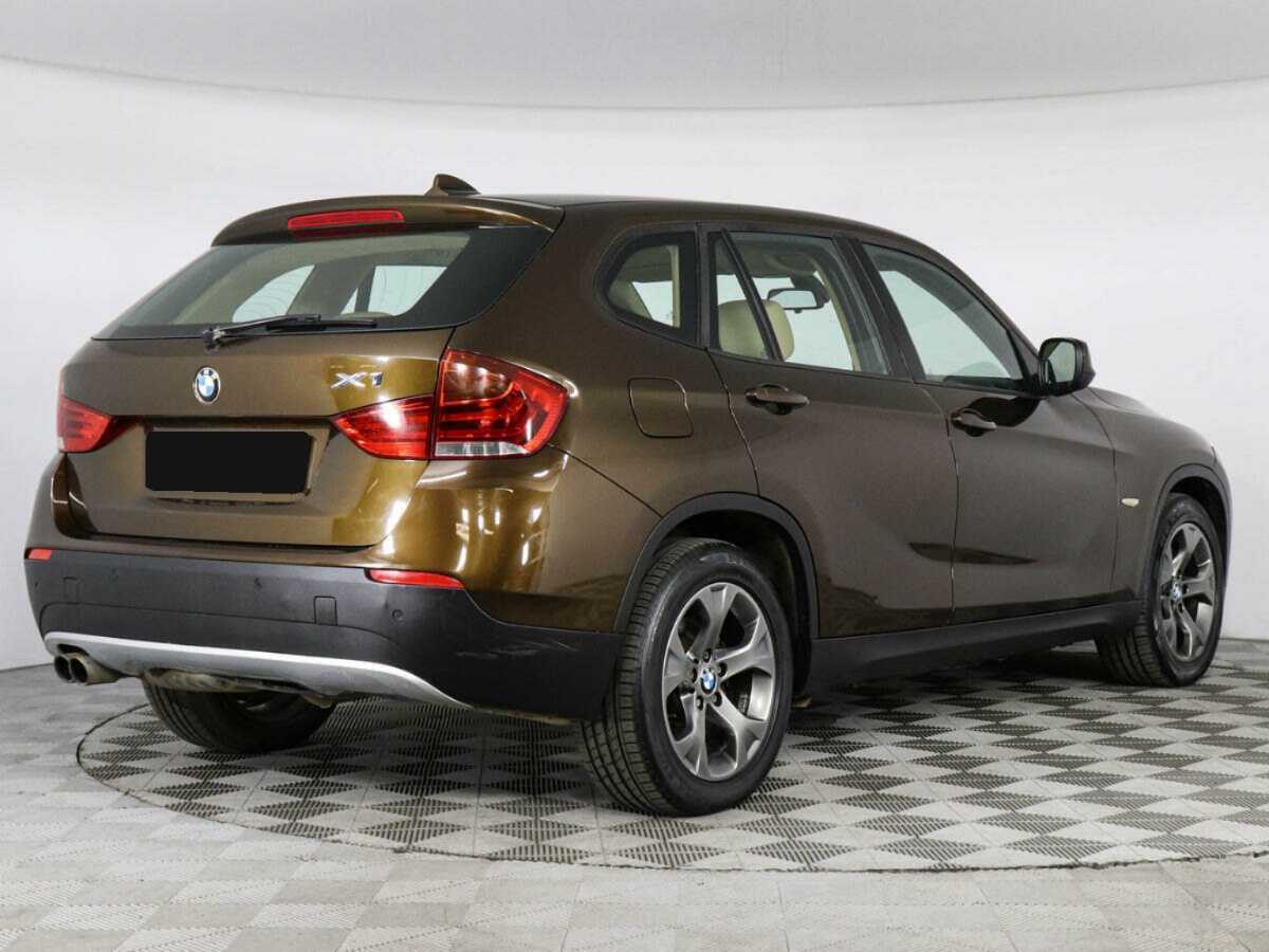 BMW X1 с пробегом — 2010 год. Фото: #1