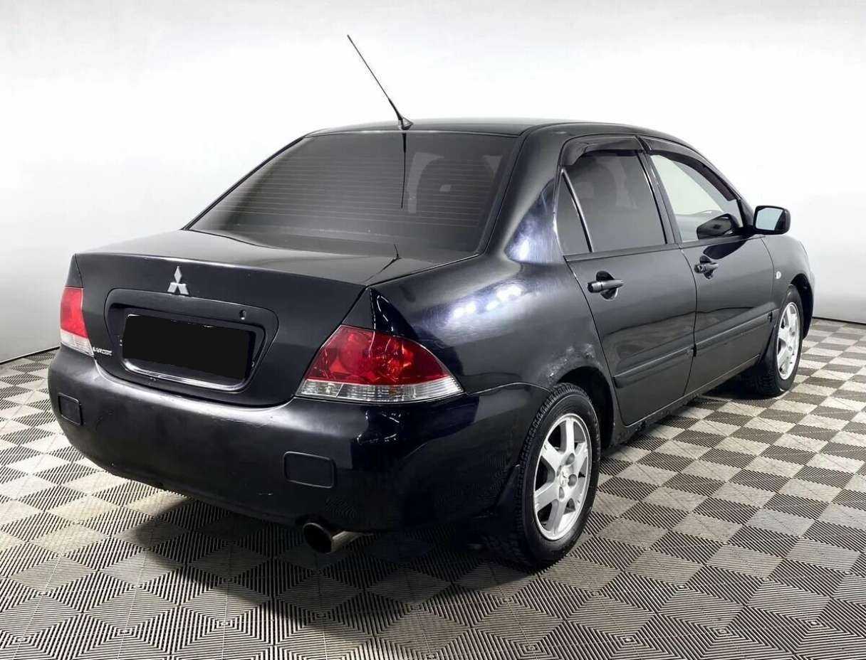 Mitsubishi Lancer с пробегом — 2006 год. Фото: #4