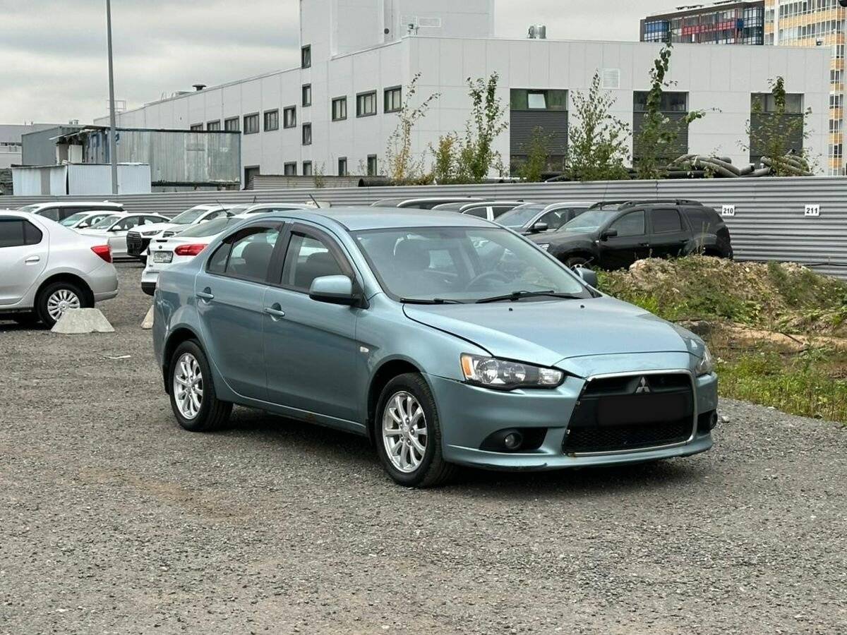 Mitsubishi Lancer с пробегом — 2011 год. Фото: #1