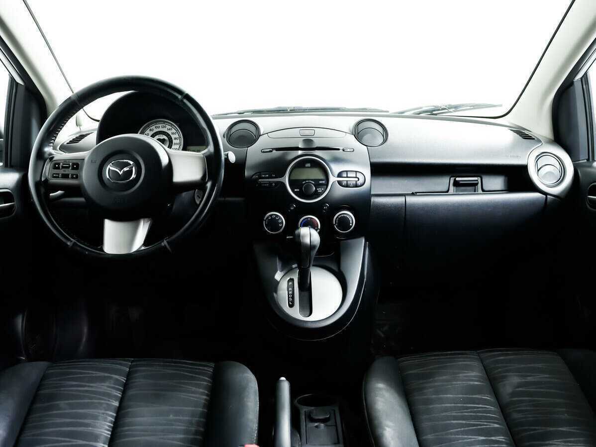 Mazda 2 с пробегом — 2009 год. Фото: #9