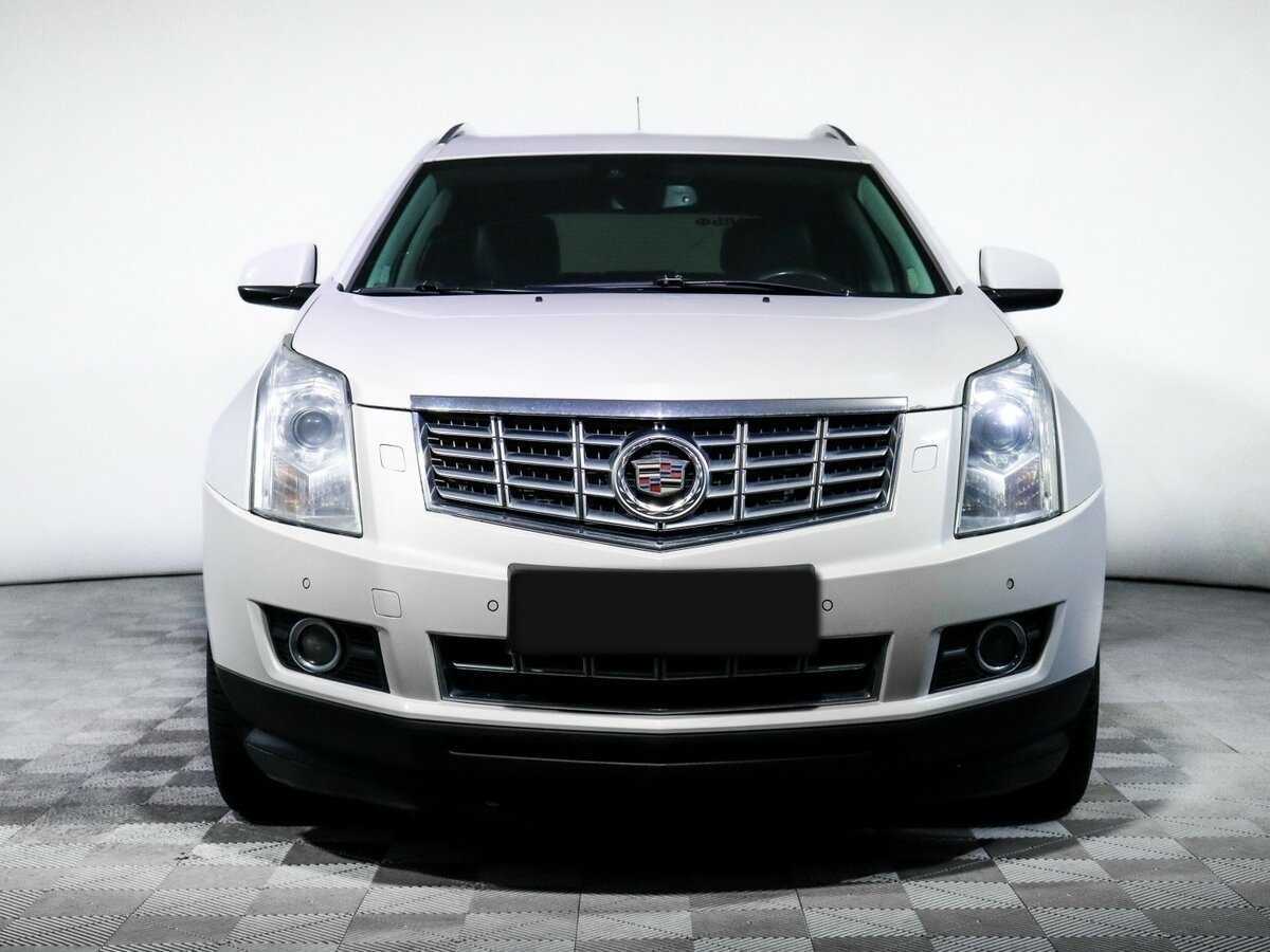 Cadillac SRX с пробегом — 2013 год. Фото: #1