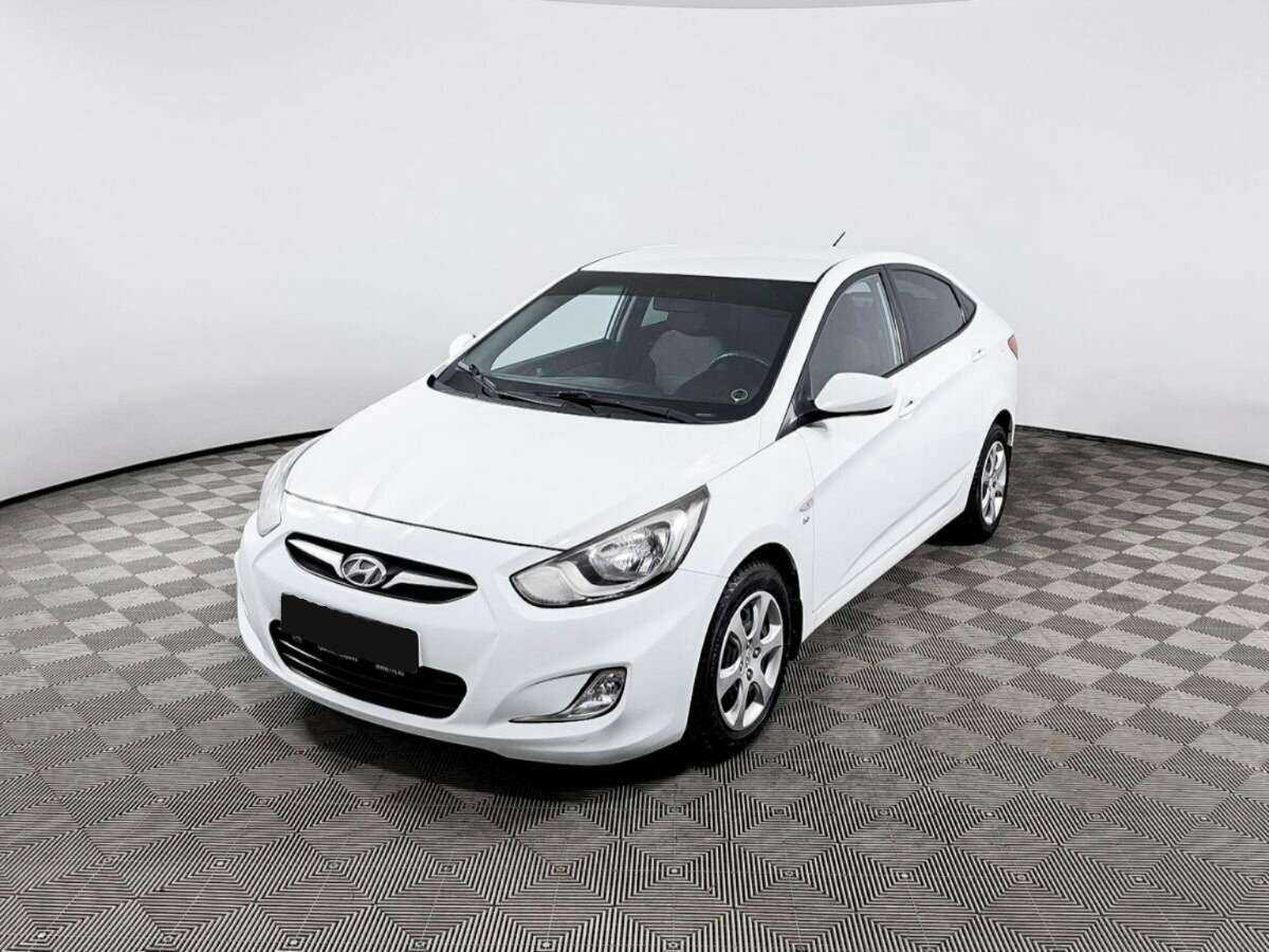 Hyundai Solaris с пробегом — 2013 год. Фото: #0