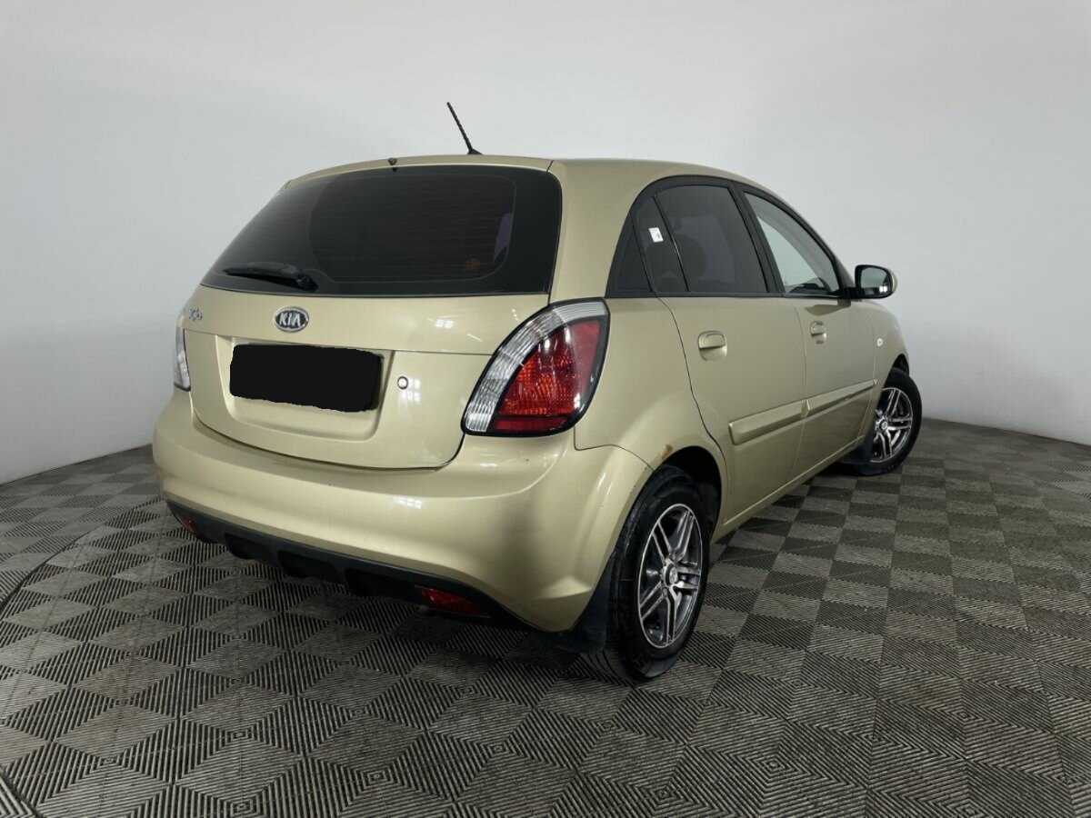 Kia Rio с пробегом — 2010 год. Фото: #5