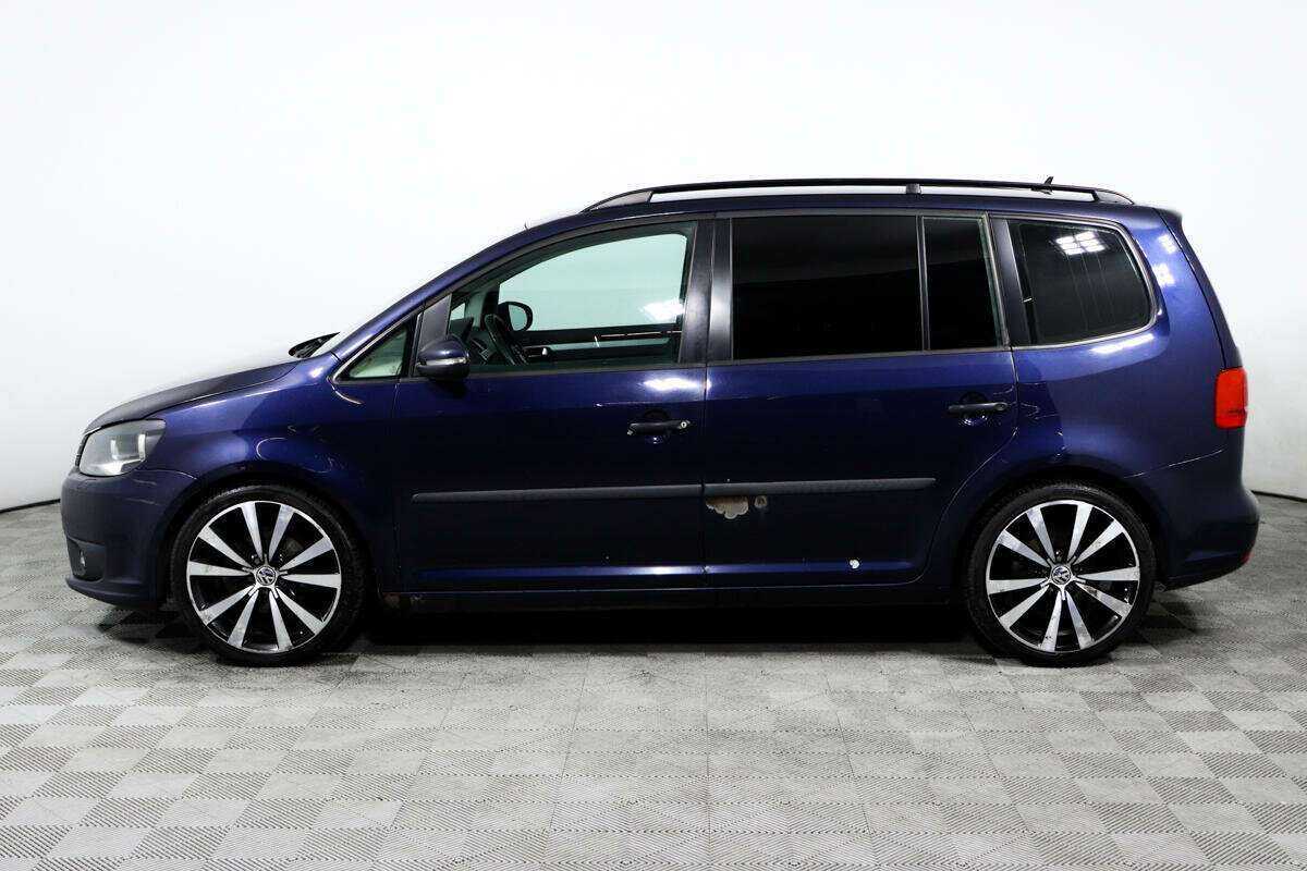 Volkswagen Touran с пробегом — 2012 год. Фото: #7