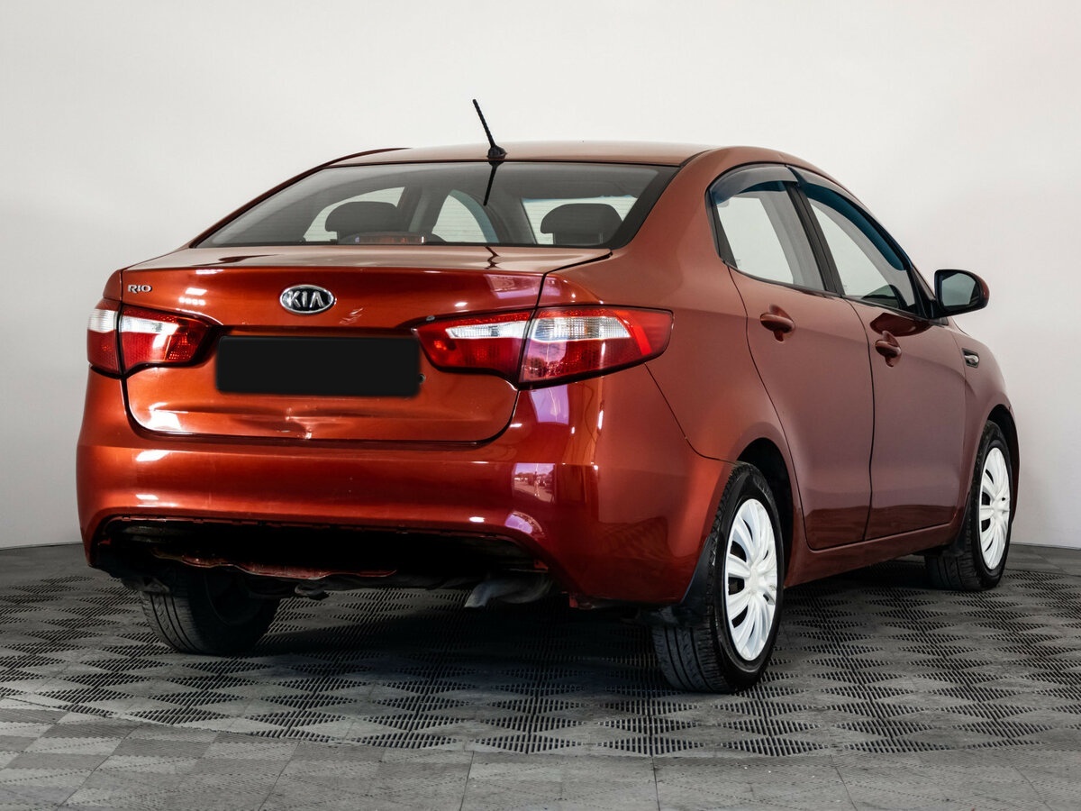 Kia Rio с пробегом — 2011 год. Фото: #3