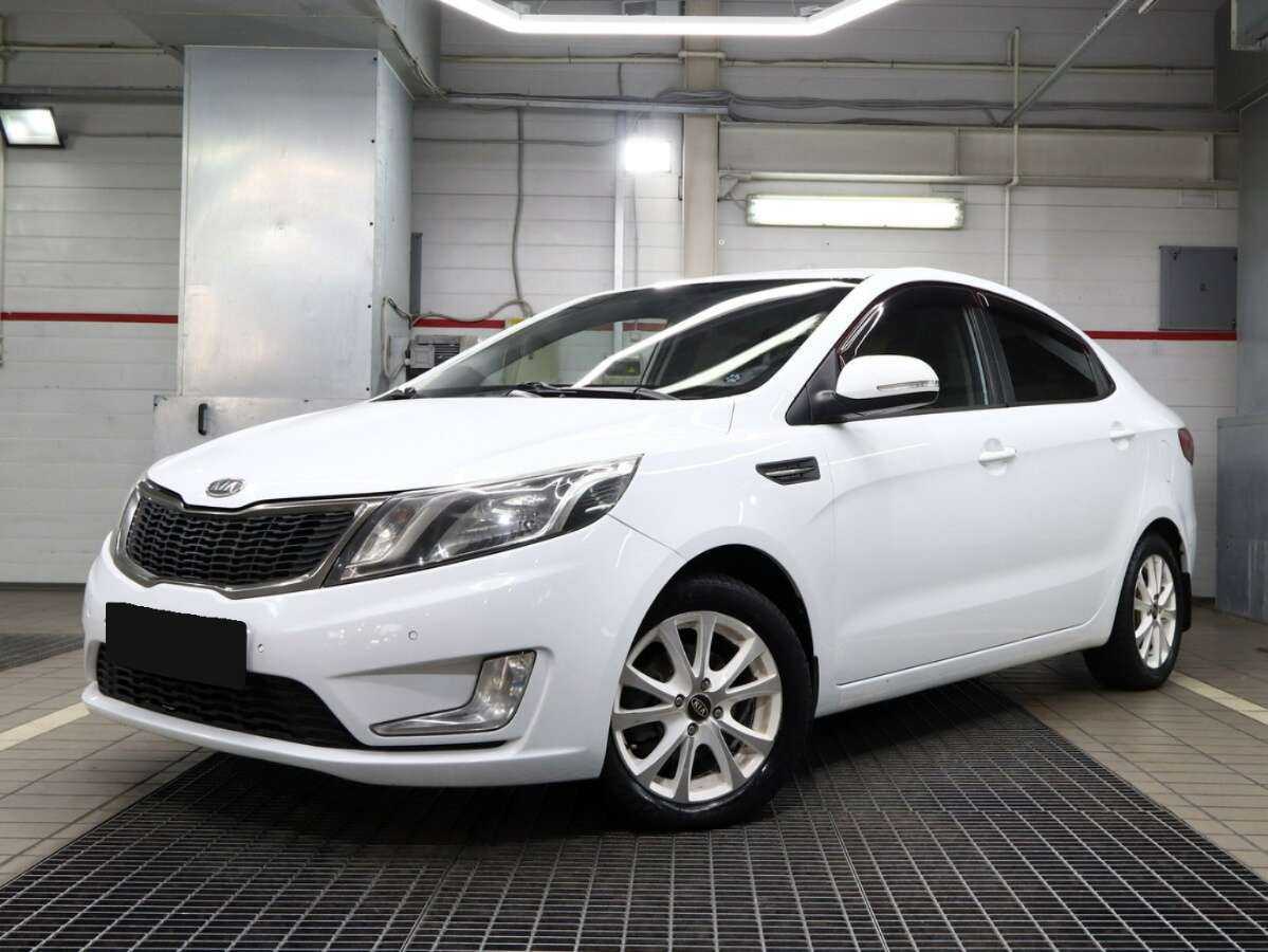 Kia Rio с пробегом — 2012 год. Фото: #0