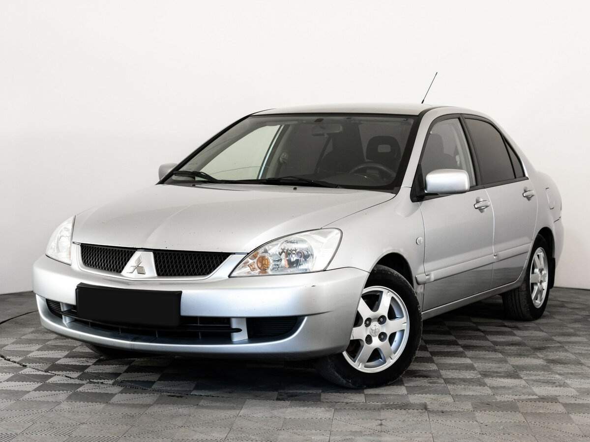 Mitsubishi Lancer с пробегом — 2006 год. Фото: #0