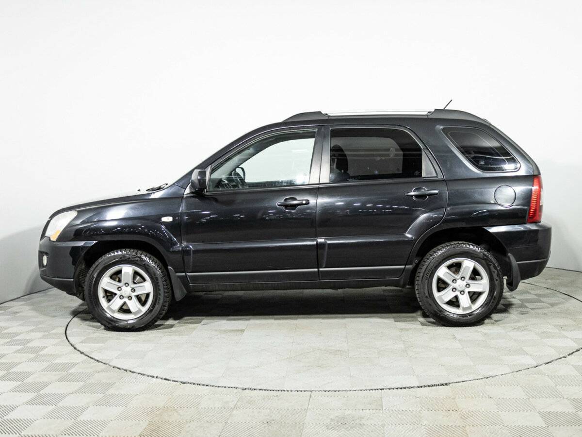 Kia Sportage с пробегом — 2009 год. Фото: #7