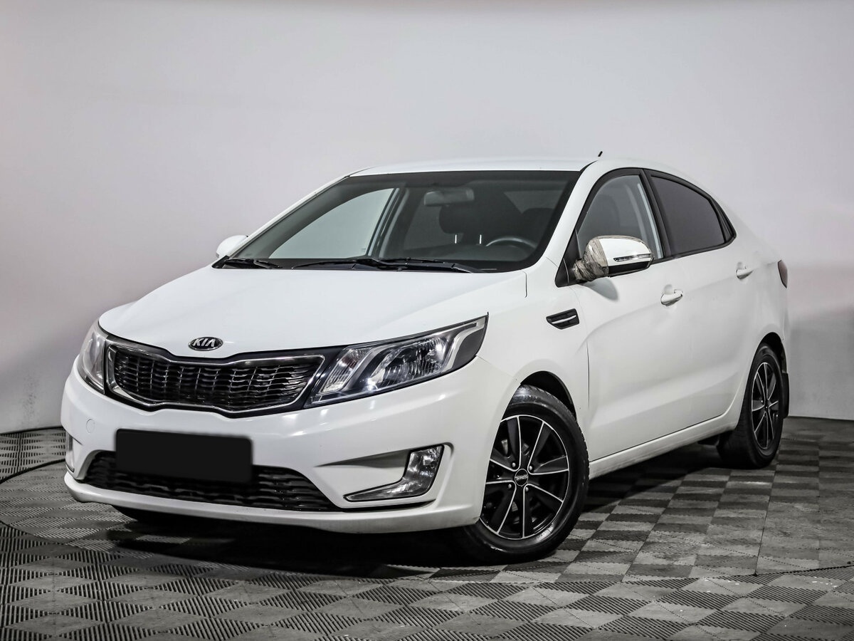 Kia Rio с пробегом — 2013 год. Фото: #0