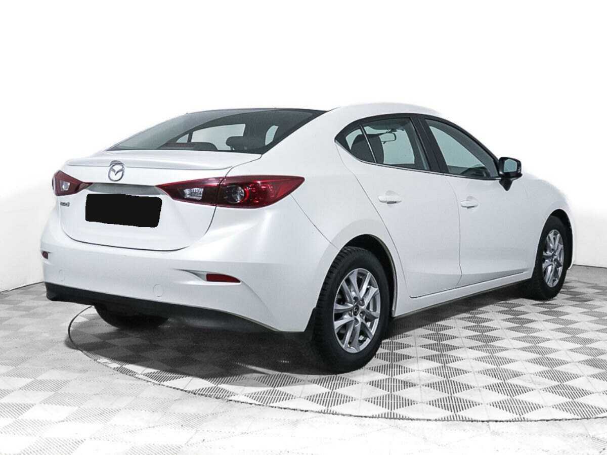 Mazda 3 с пробегом — 2014 год. Фото: #4