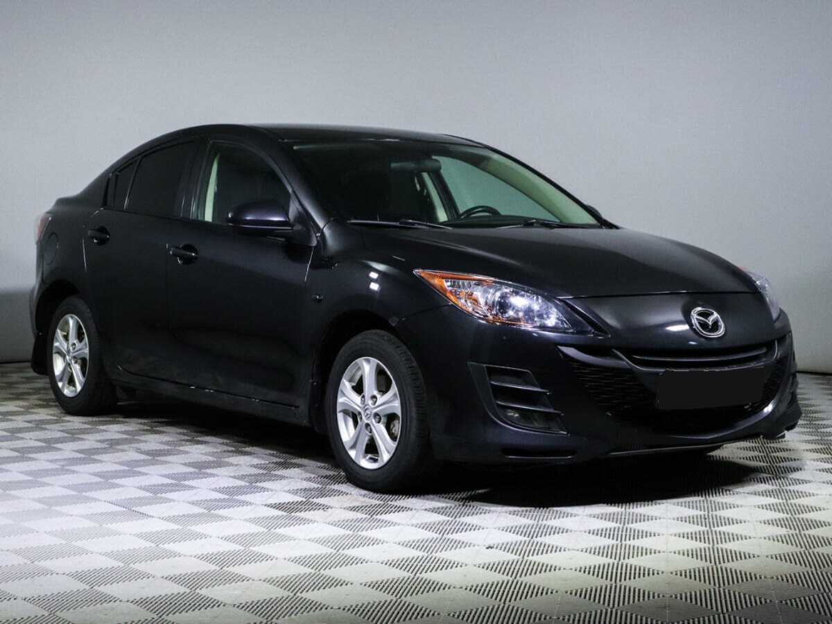 Mazda 3 с пробегом — 2011 год. Фото: #2