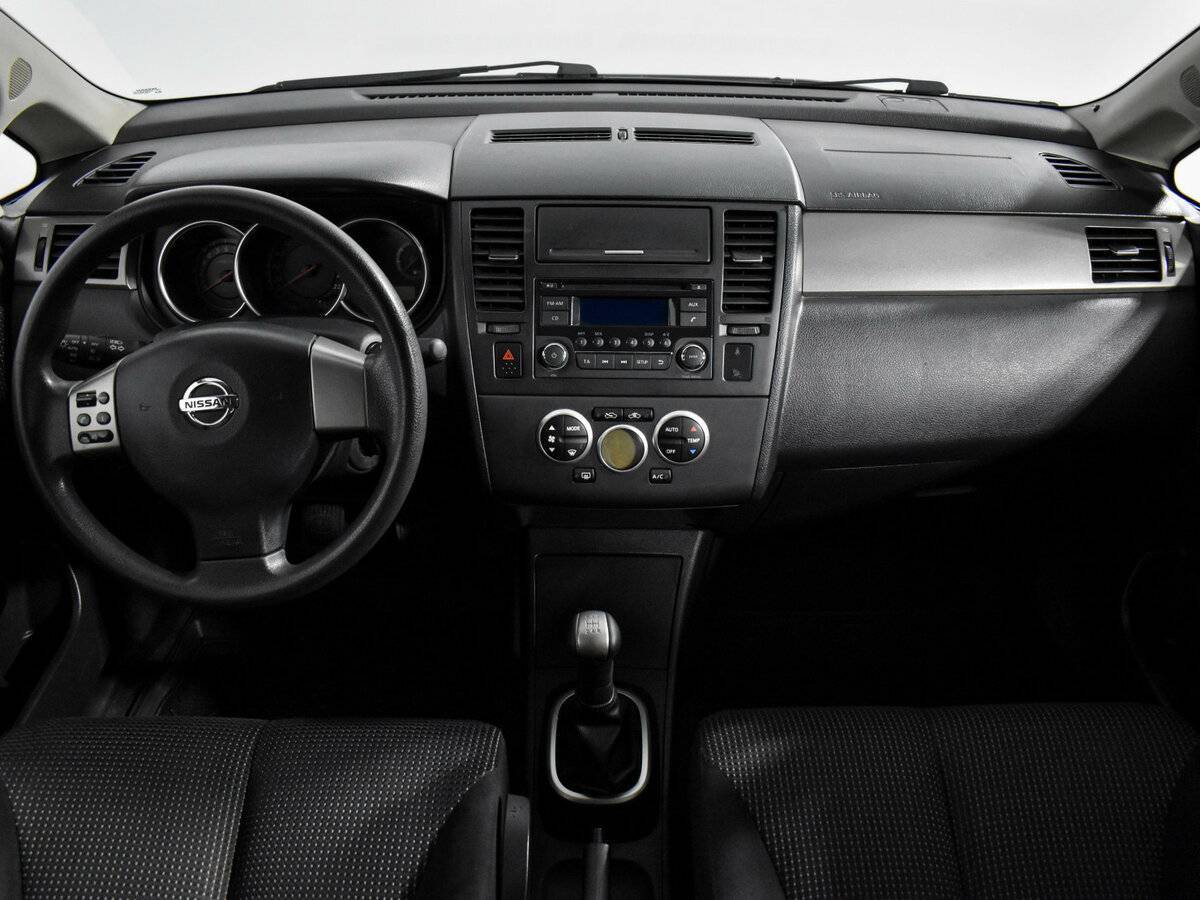 Nissan Tiida с пробегом — 2013 год. Фото: #12