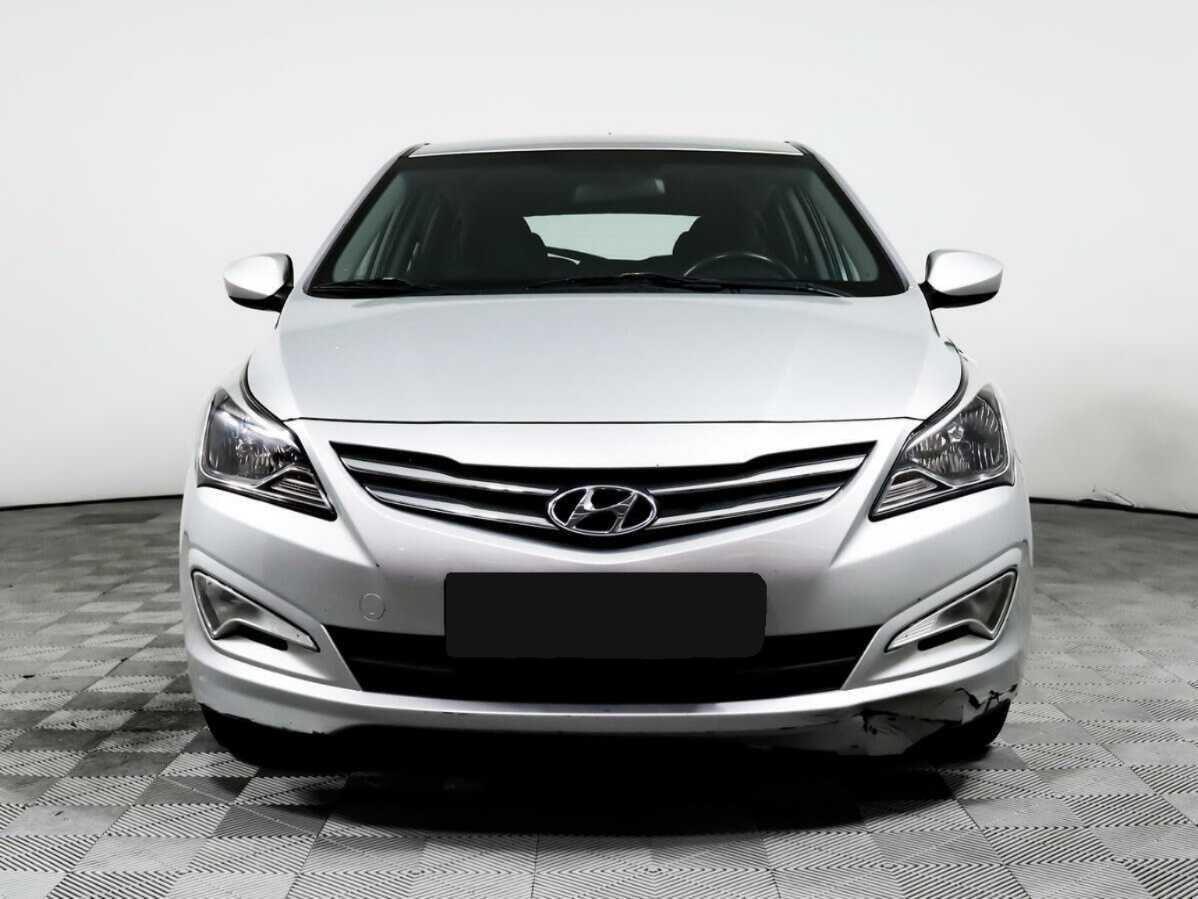 Hyundai Solaris с пробегом — 2014 год. Фото: #1