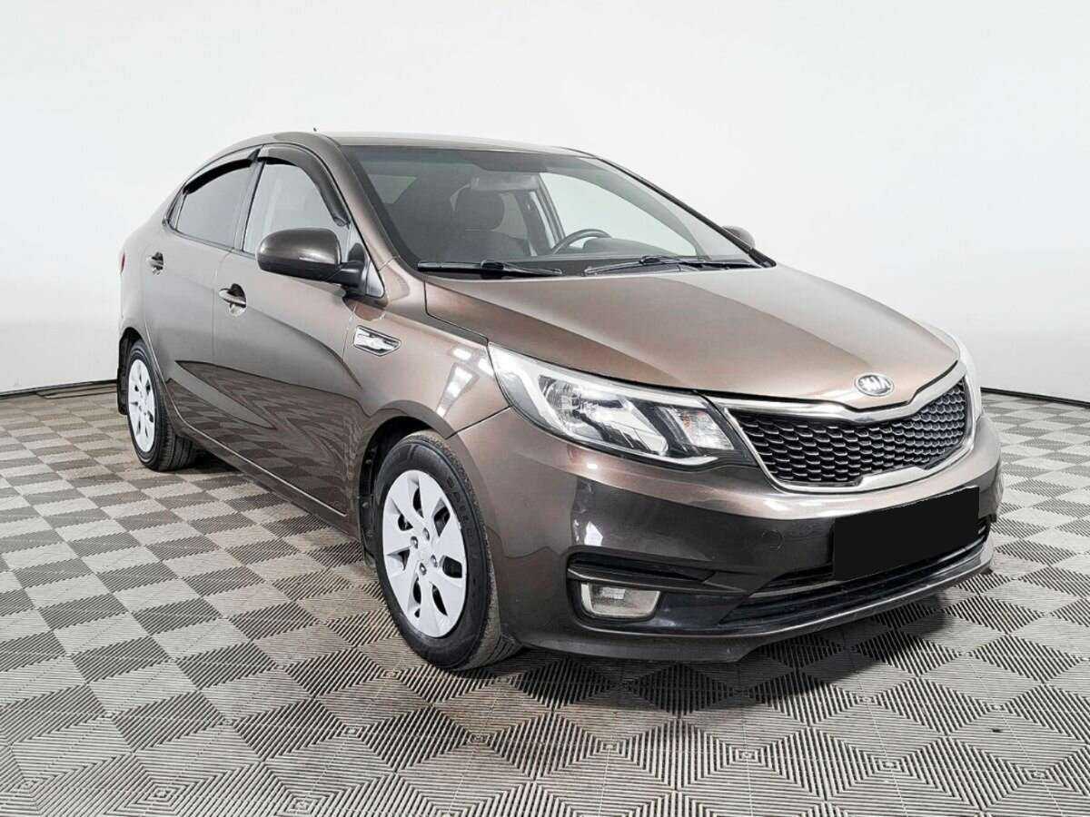 Kia Rio с пробегом — 2015 год. Фото: #2