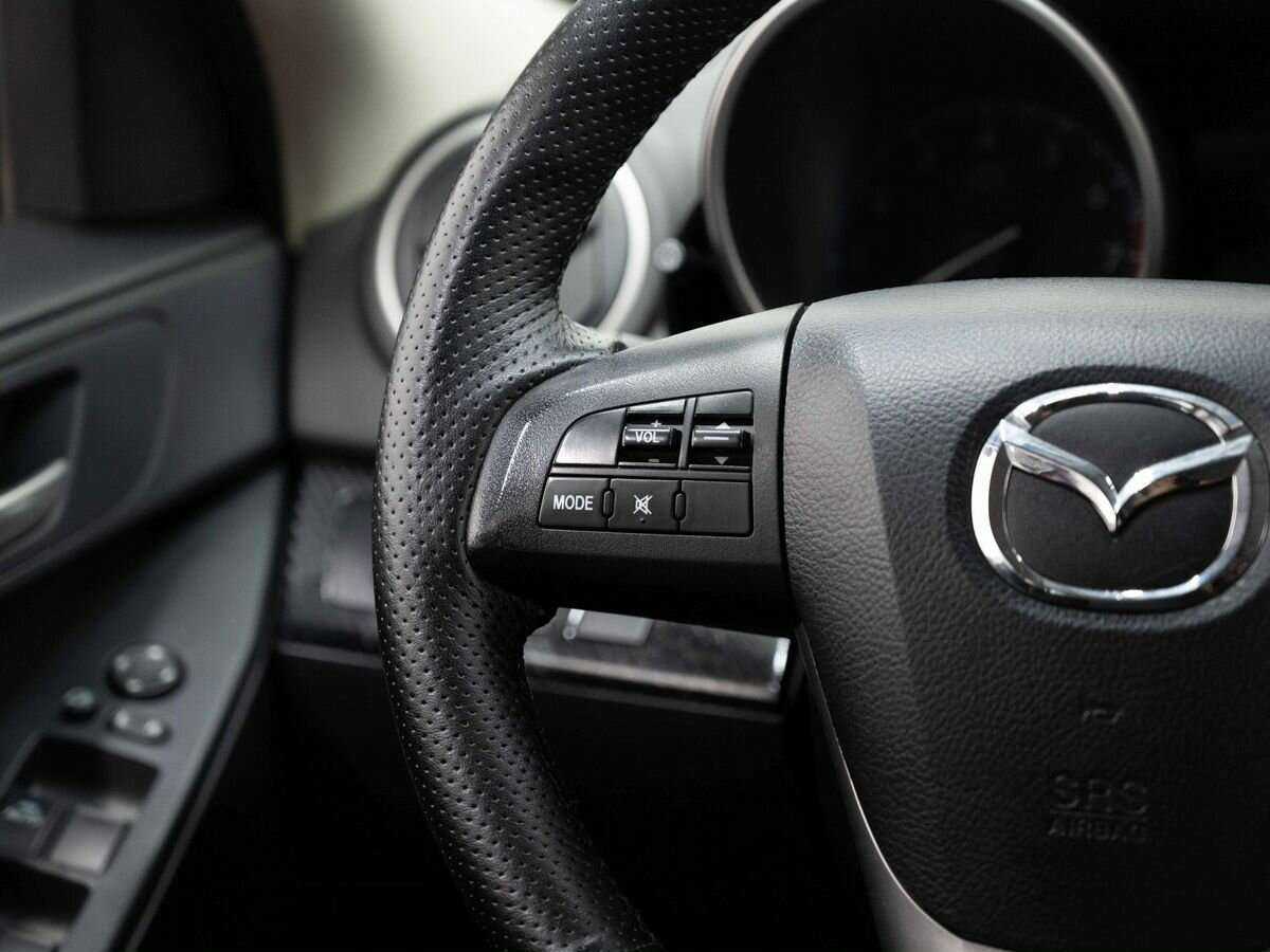 Mazda 3 с пробегом — 2011 год. Фото: #12