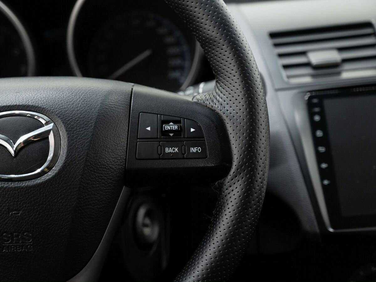 Mazda 3 с пробегом — 2011 год. Фото: #13