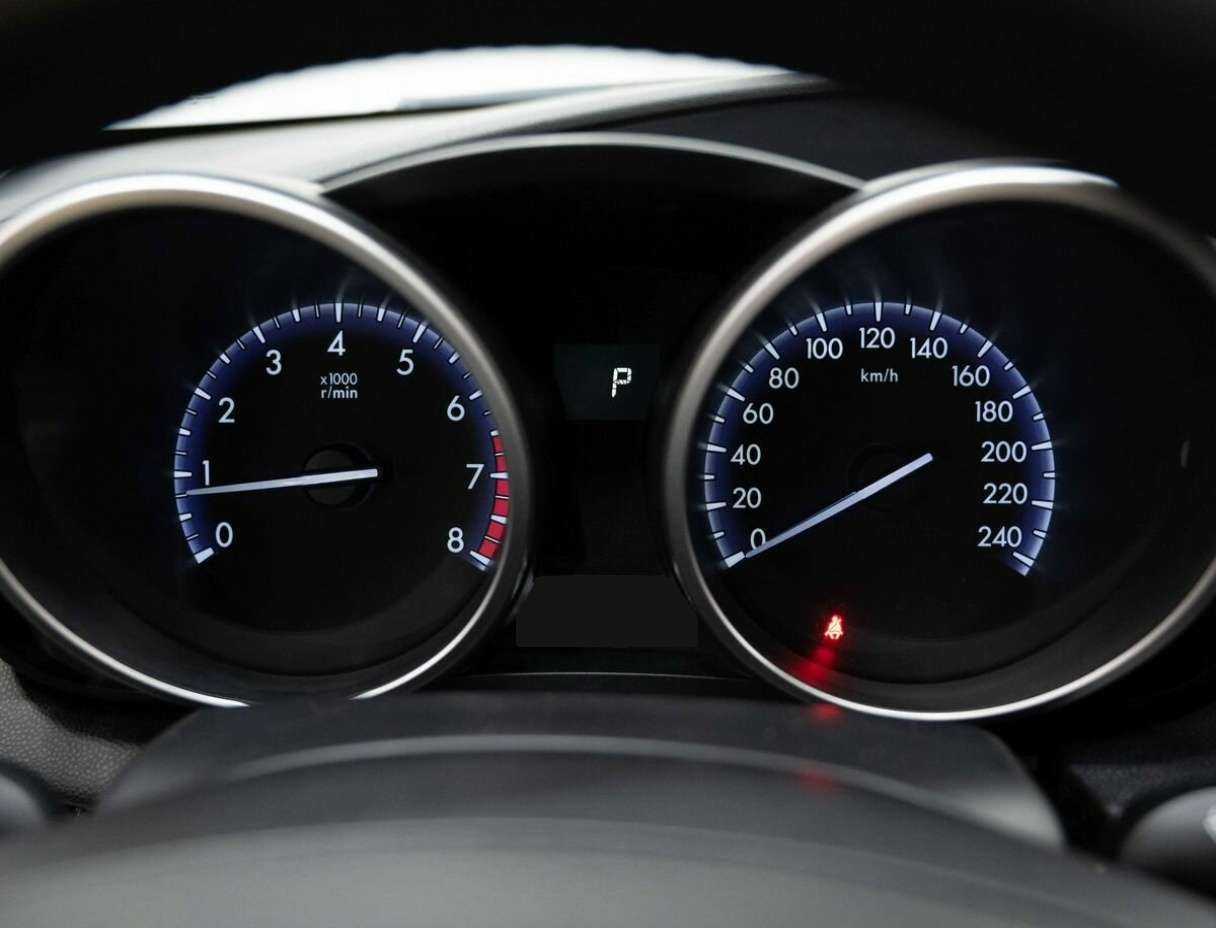 Mazda 3 с пробегом — 2011 год. Фото: #14