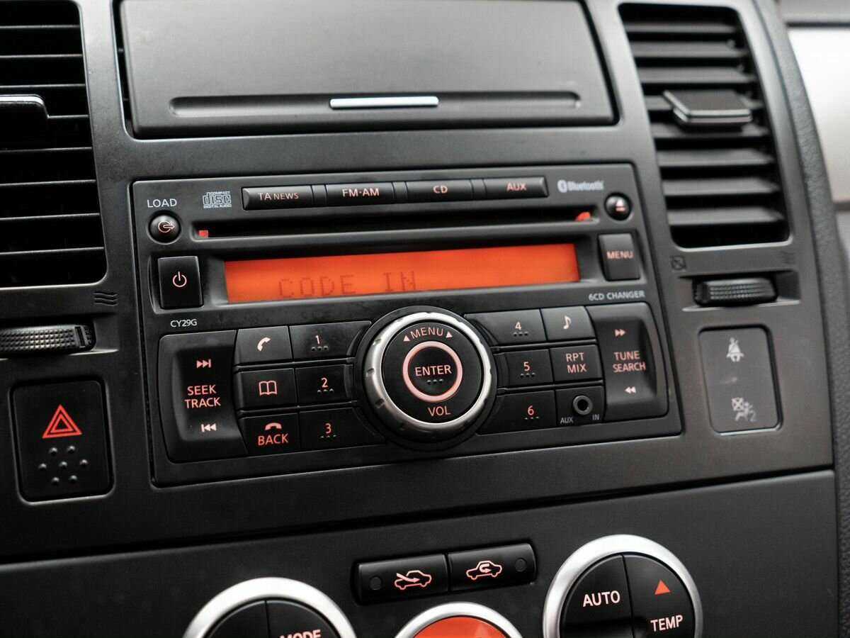 Nissan Tiida с пробегом — 2011 год. Фото: #12