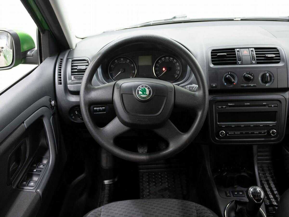 Skoda Fabia с пробегом — 2012 год. Фото: #13