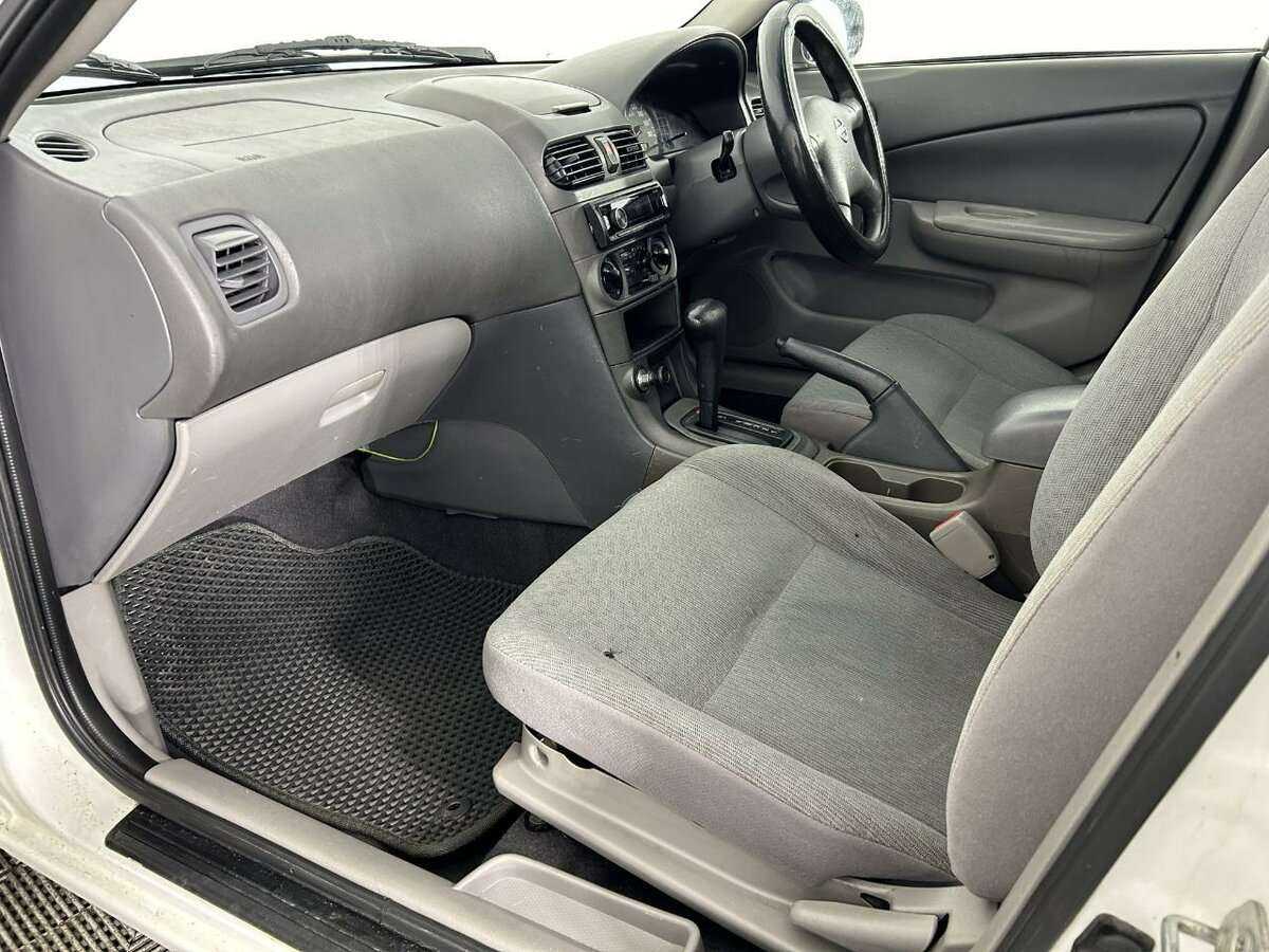 Nissan Sunny с пробегом — 2004 год. Фото: #13