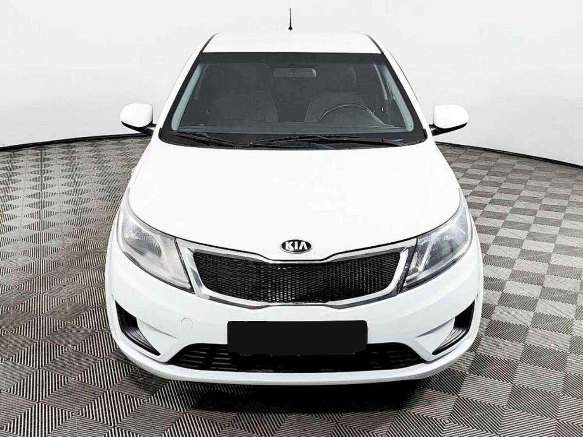 Kia Rio с пробегом — 2014 год. Фото: #1