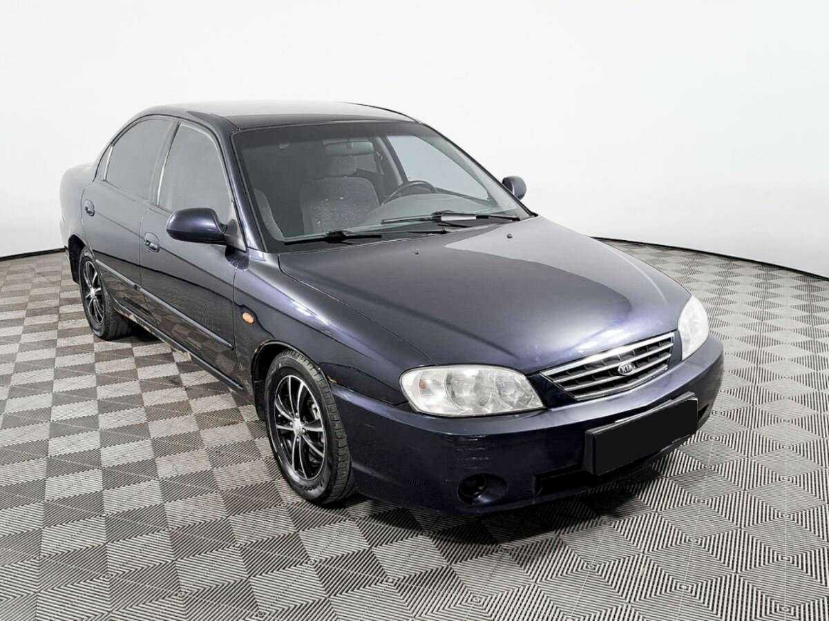 Kia Spectra с пробегом — 2009 год. Фото: #2