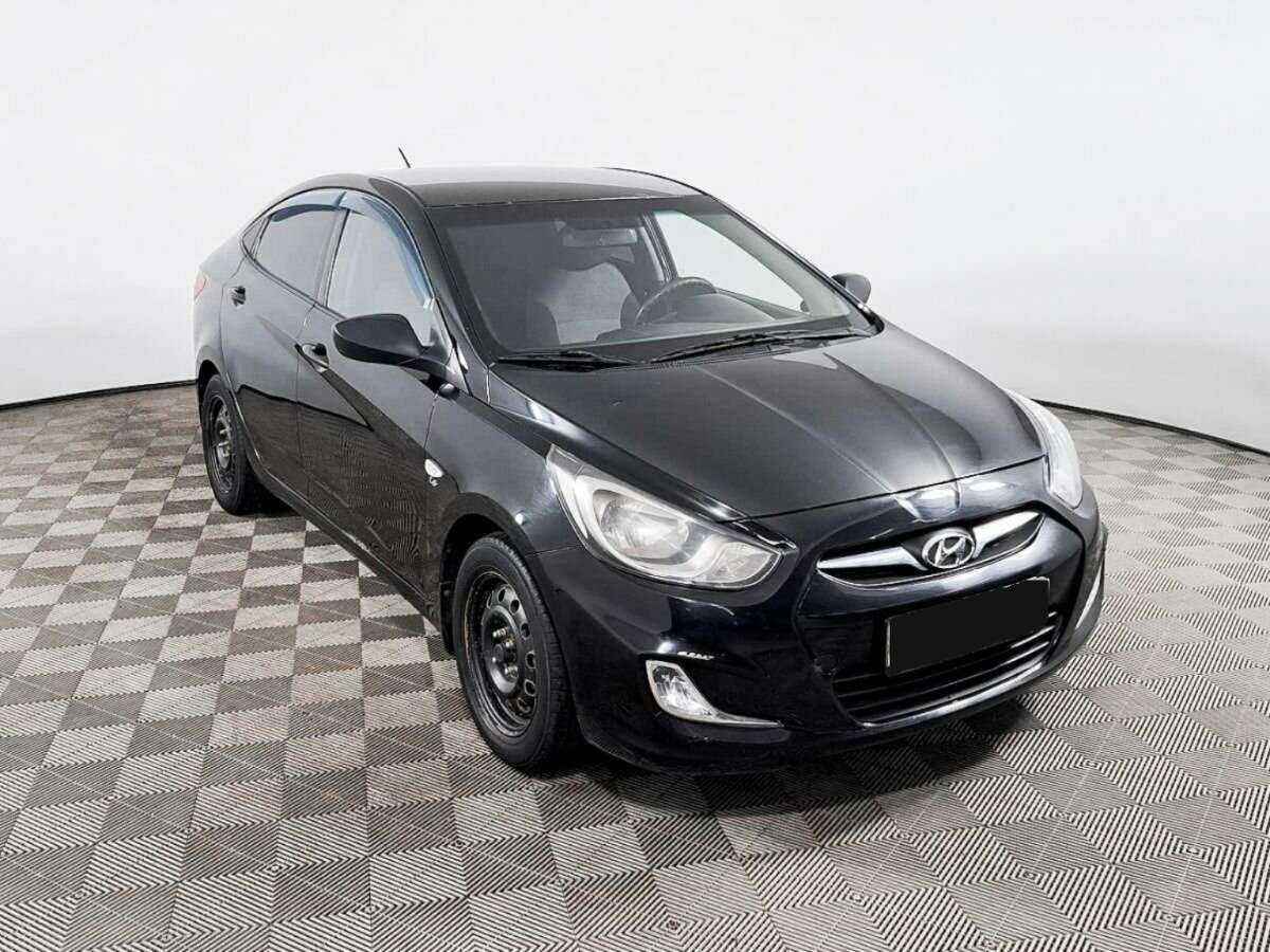 Hyundai Solaris с пробегом — 2011 год. Фото: #2