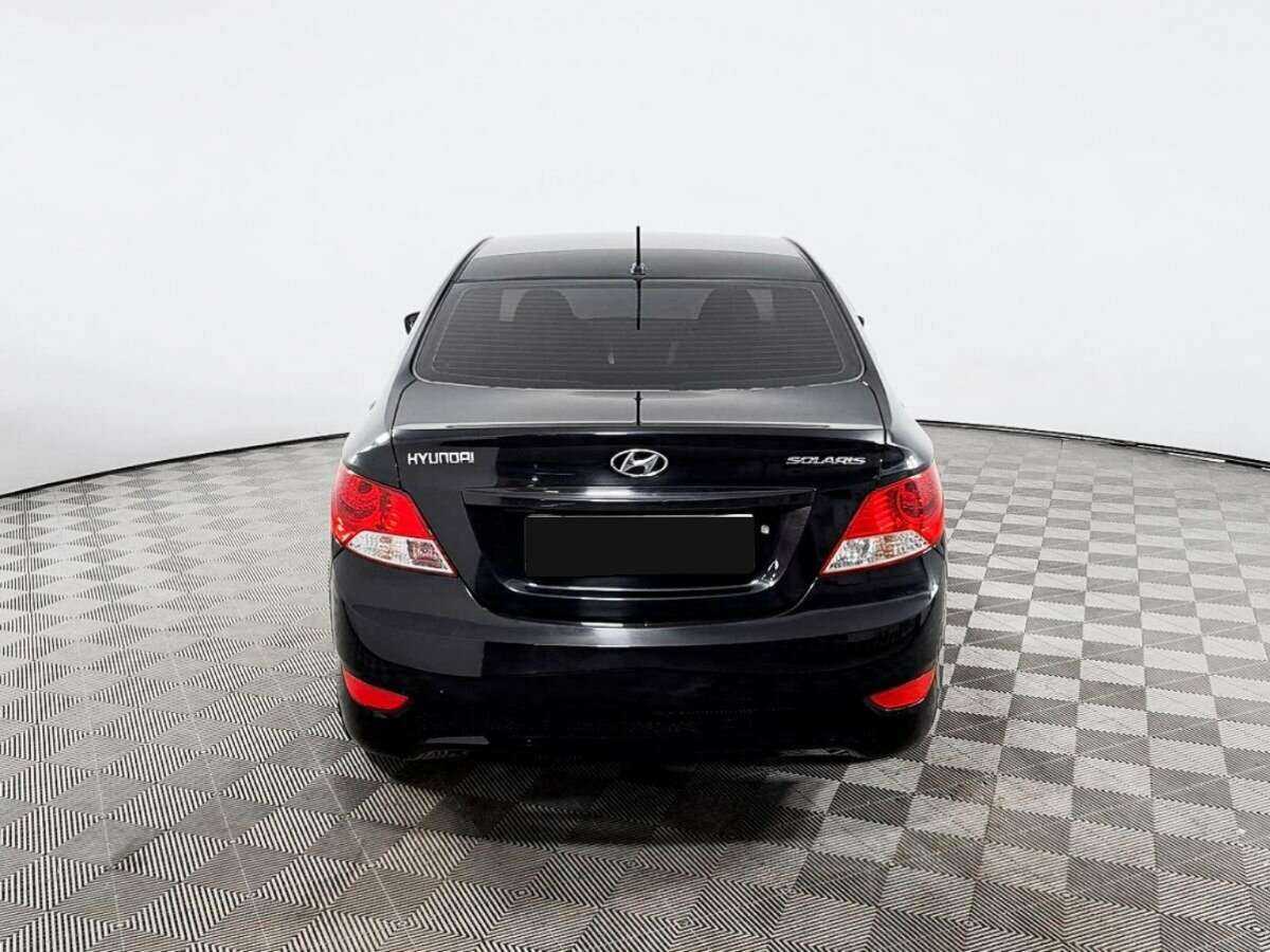 Hyundai Solaris с пробегом — 2011 год. Фото: #4